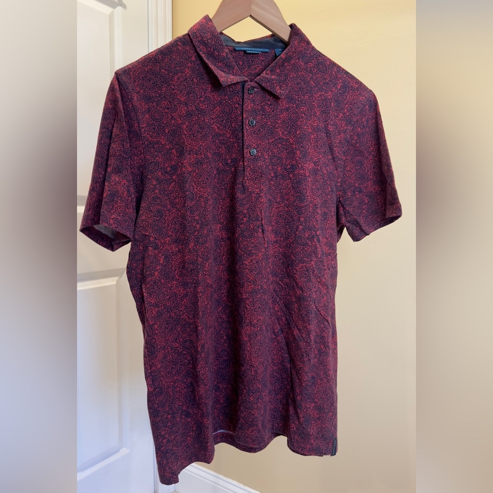 Red patterned polo shirt